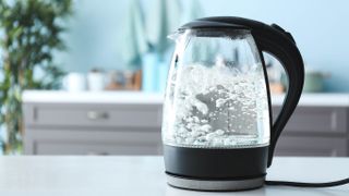 An electric glass kettle boiling water
