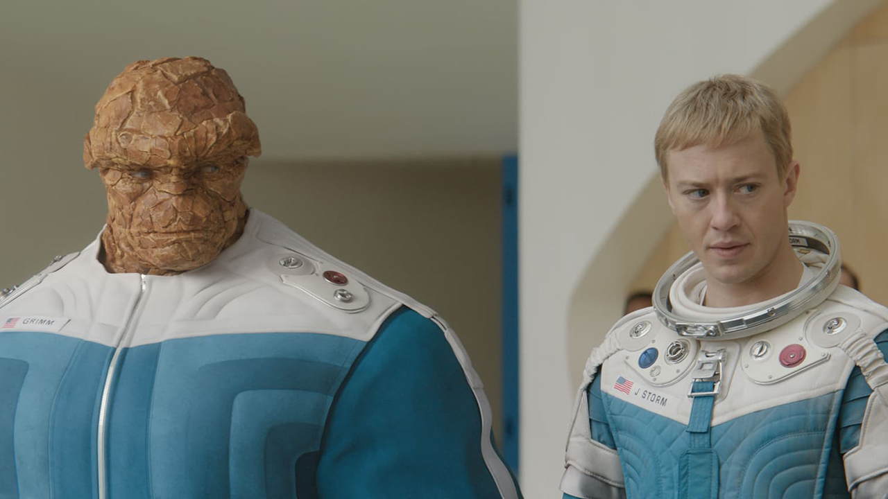 Screenshot from The Fantastic Four: First Steps showing Ben Grimm (The Thing) and Johnny Storm (Human Torch), played by Ebon Moss-Bachrach and Joseph Quinn, respectively.