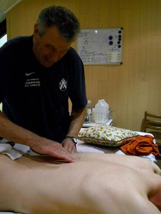 Herman gives Rider X a massage.