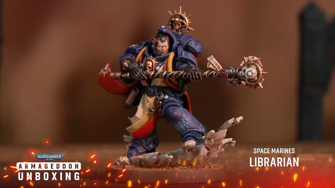 Warhammer 40K Space Marine models on a rocky battlefield