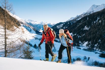 Couple go on holiday to ski above Swiss village after fresh snow