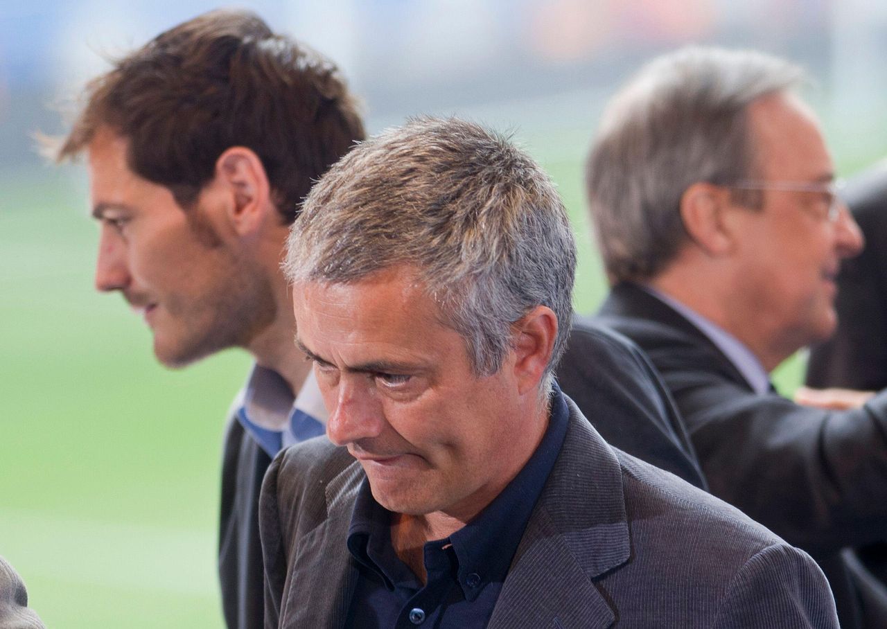 Real Madrid manager Jose Mourinho and goalkeeper Iker Casillas, with club president Florentino Perez in the background, 2012