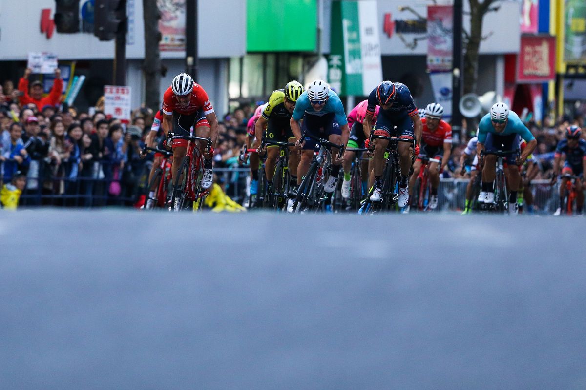 The riders sprint for the line