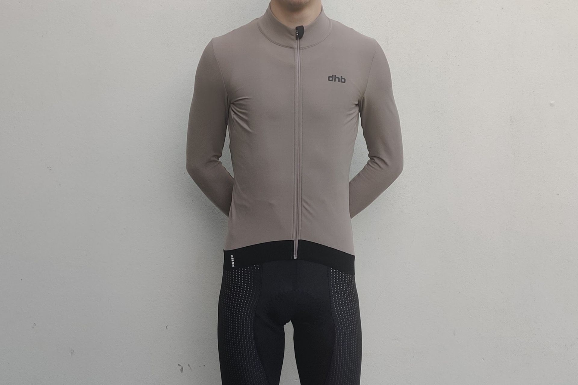 Image shows a rider wearing the dhb Aeron Thermal Long Sleeve Jersey.