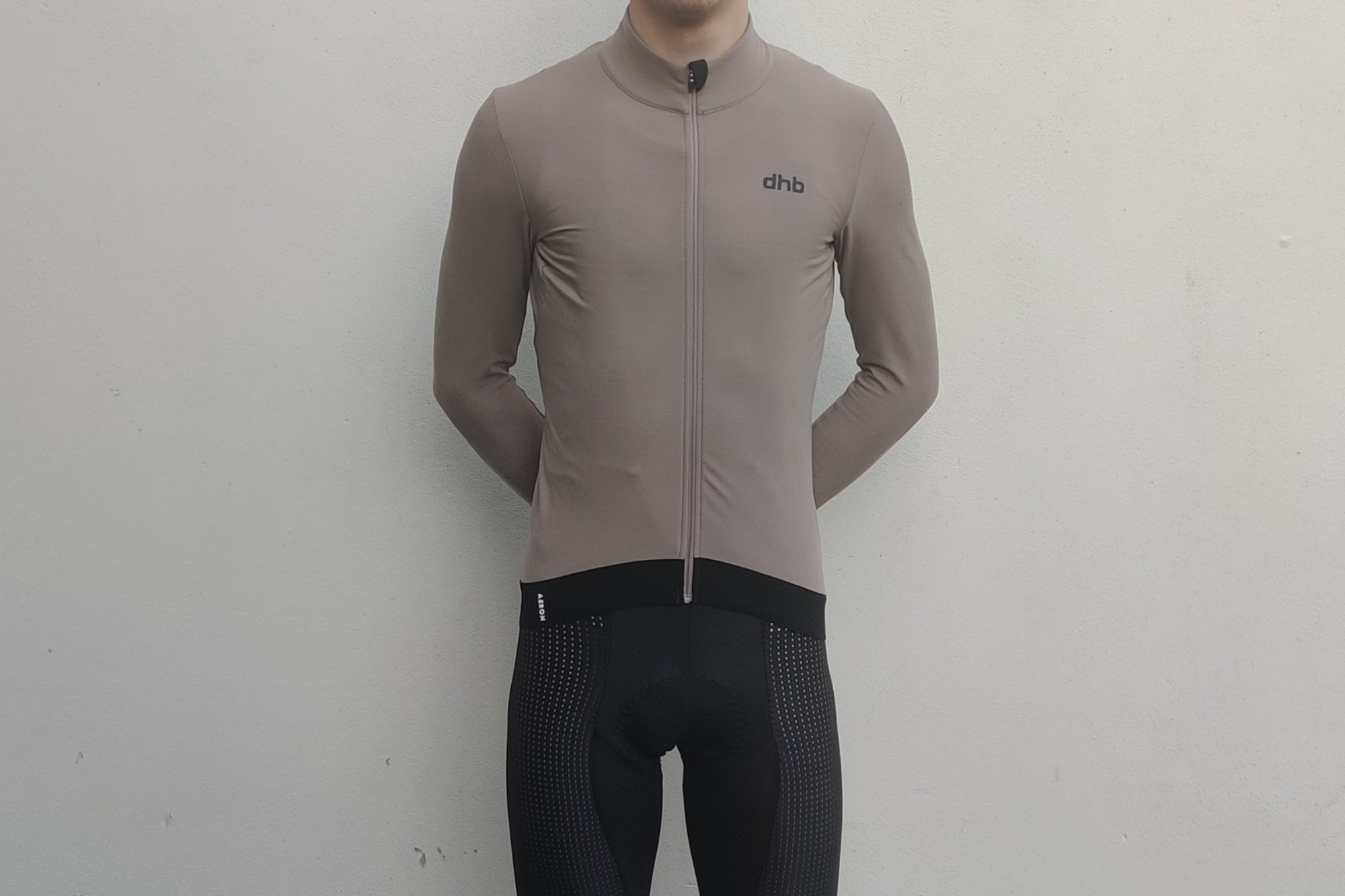Male cyclist wearing the dhb Aeron Thermal Long Sleeve Jersey.