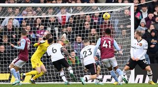 Jacob Ramsey of Aston Villa scores their team's third goal during the Premier League match between Aston Villa and Manchester United at Villa Park.