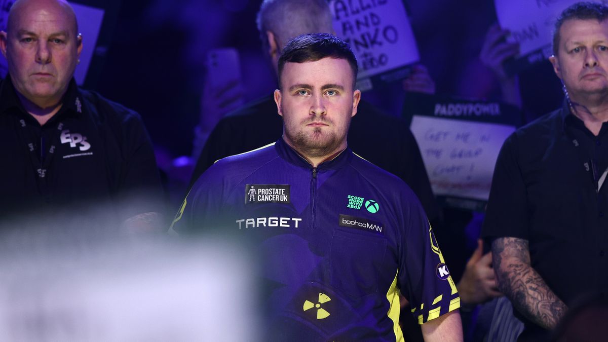 Luke Littler looks straight ahead as he walks into the arena for his quarter final at the PDC World Darts Championship