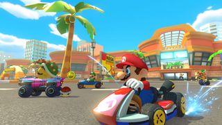 Mario Kart 8 Deluxe showing Mario racing Bowser