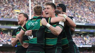 Tommy Freeman celebrates his try against Leinster Rugby.