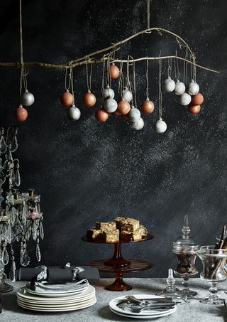 branch chandelier with metallic baubles by Annie Sloan