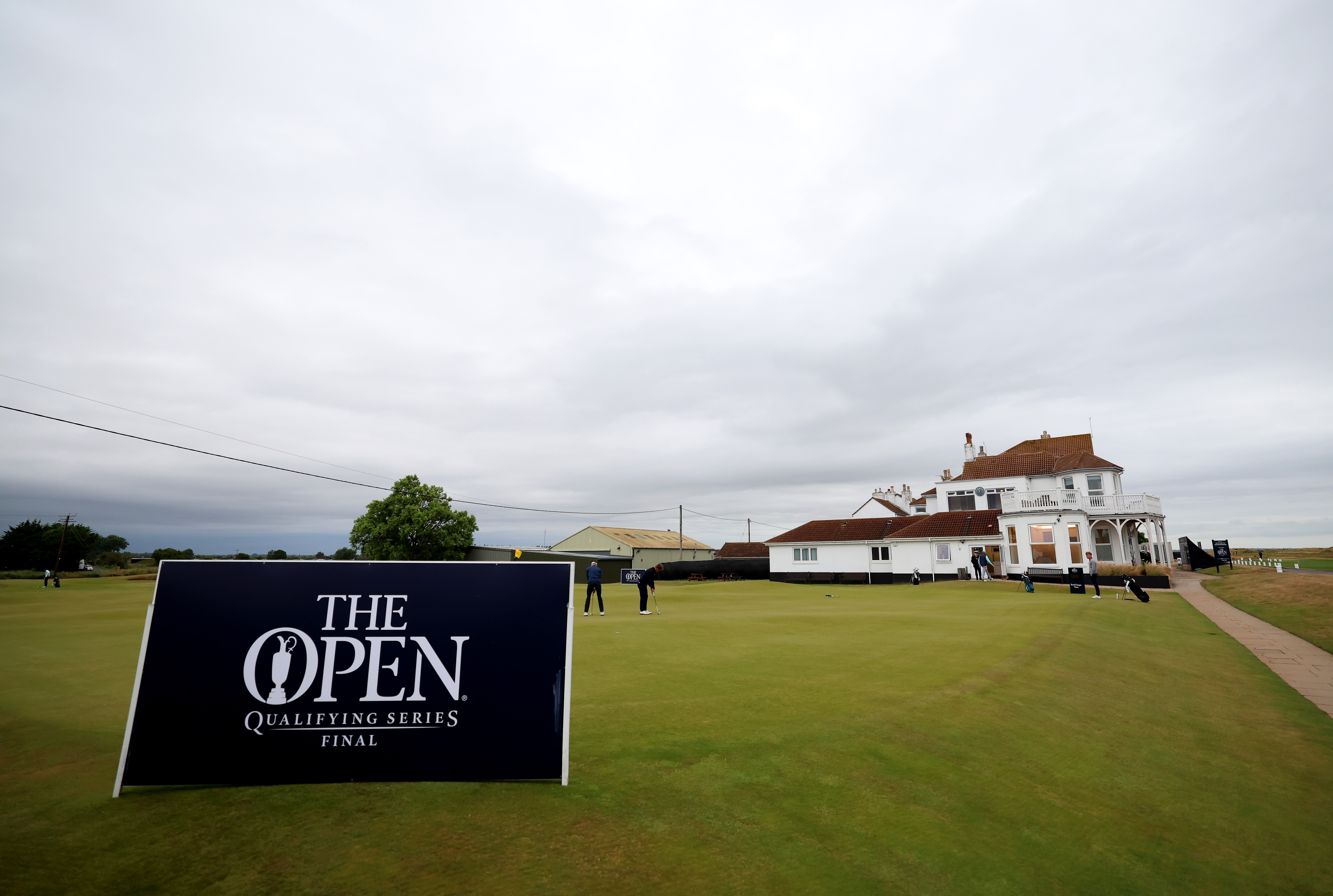 An Open Championship sign by Royal Cinque Ports clubhouse