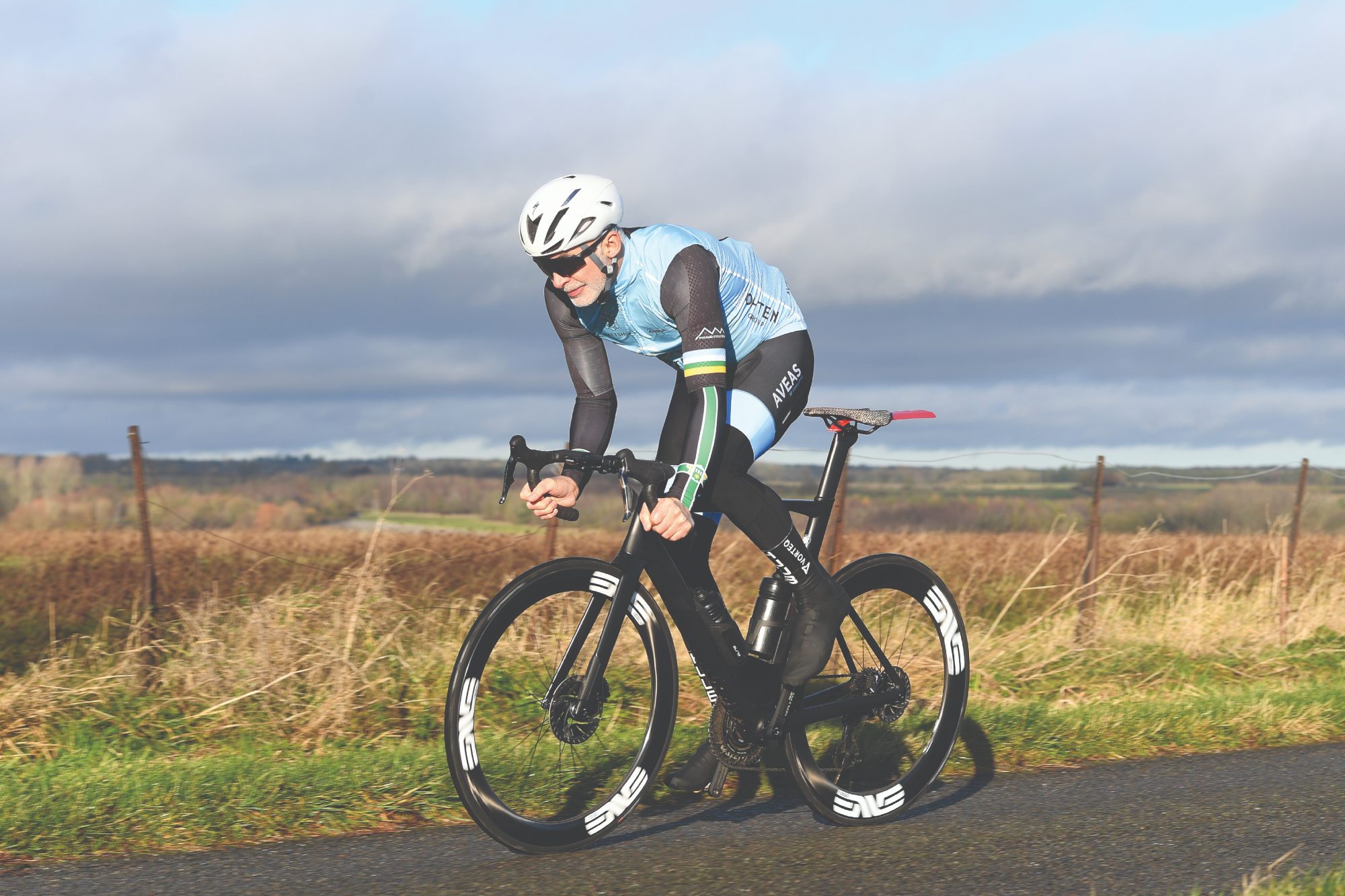 Image shows a person cycling