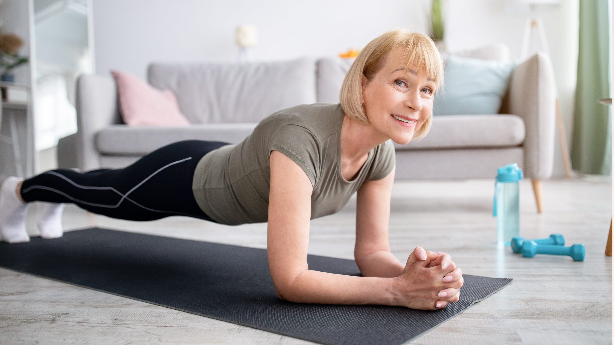 older woman doing a plank