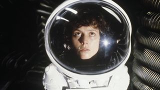 Sigourney Weaver as Ripley wearing a spacesuit in the movie Alien.