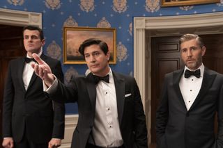 Nathan Lovejoy as Ambassador Alden Tamridge, Ken Marino as Harry Hollinger, Brett Tucker as David Rylance wearing suits and speaking in a white house room in the tv show the residence