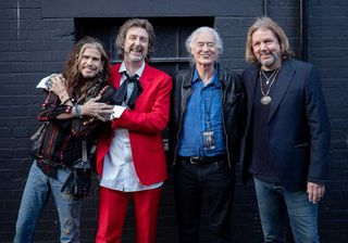 Steven Tyler, Chris and Rich Robinson and Jimmy Page pose outside the Eventim Apollo in Hammersmith, West London