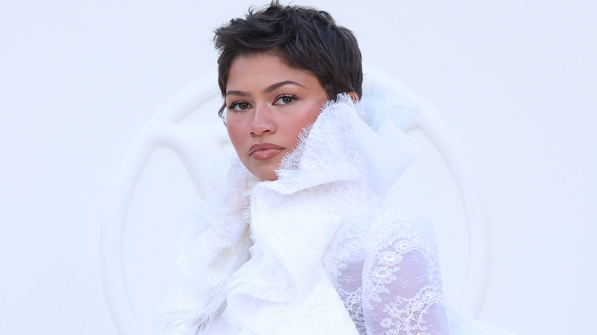 Zendaya styled Marie Antoinette-esque ruffles with the ultimate French girl denim at Louis Vuitton's Spring/Summer 2027 Paris Fashion Week show
