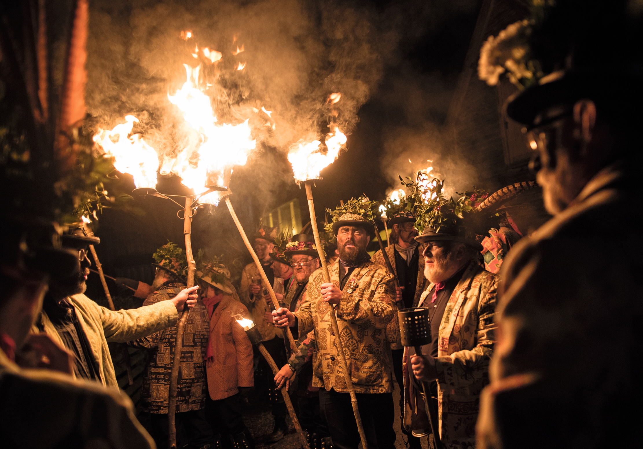 Members of the Leominster Morris lead the crowd from the Hobson Brewery in Frith Common to the nearby apple orchard to take part in a torchlit Oldfields Orchard Cider wassailing ceremony ahead of today's Twelfth Night on January 4, 2017 near Tenbury Wells in Worcestershire, England. 