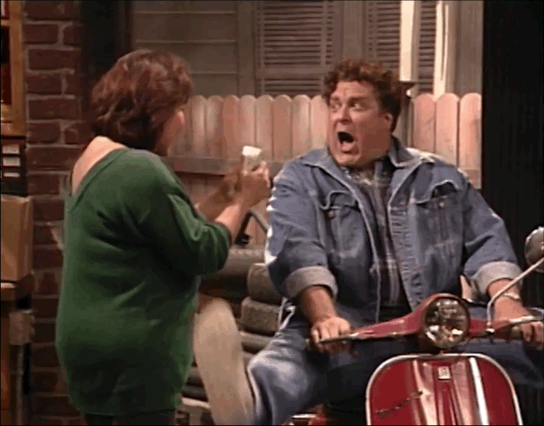 roseanne gif dan on motorcycle