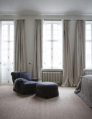 pinch pleat curtains in a bedroom