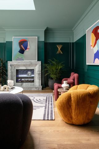 Green living room with tonal green painted ceiling