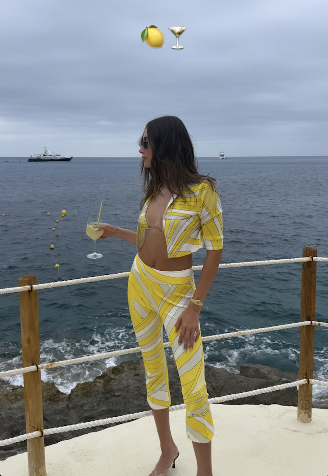 hailey bieber wore a lemon-yellow pucci set to the beach, styled with clear thong sandals