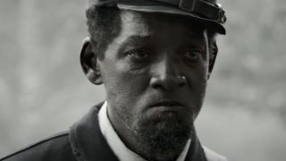 Will Smith stands sadly in uniform in Emancipation.