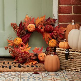 Halloween autumn door wreath with pumpkins