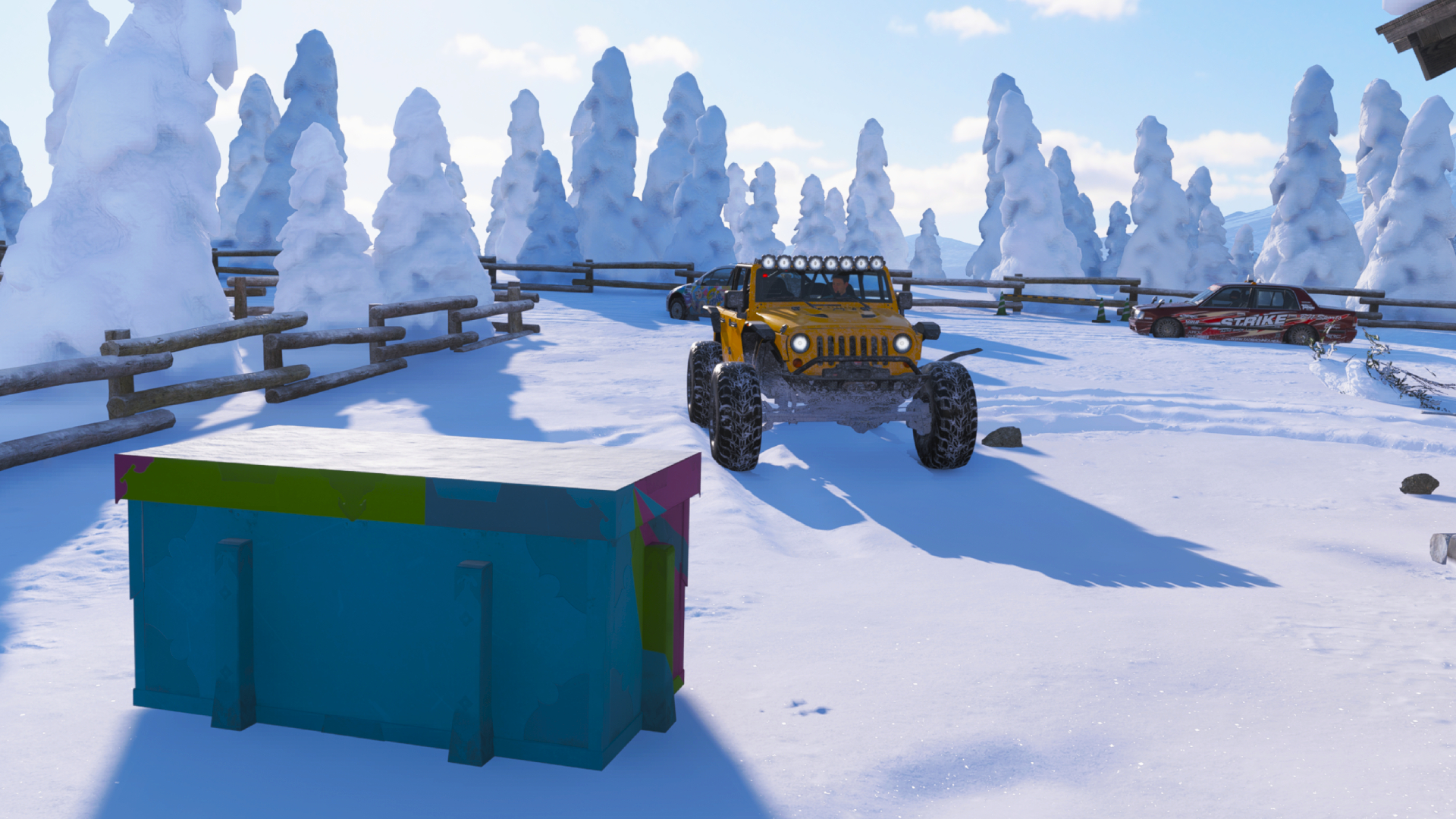 Forza Horizon 6 Sotoyama Treasure Hunt: A yellow Jeep Wrangler looking at a treasure chest on a snowy mountain.
