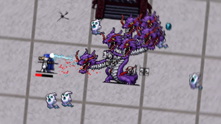 Fighting a multi-headed dragon in Vampire Survivors.