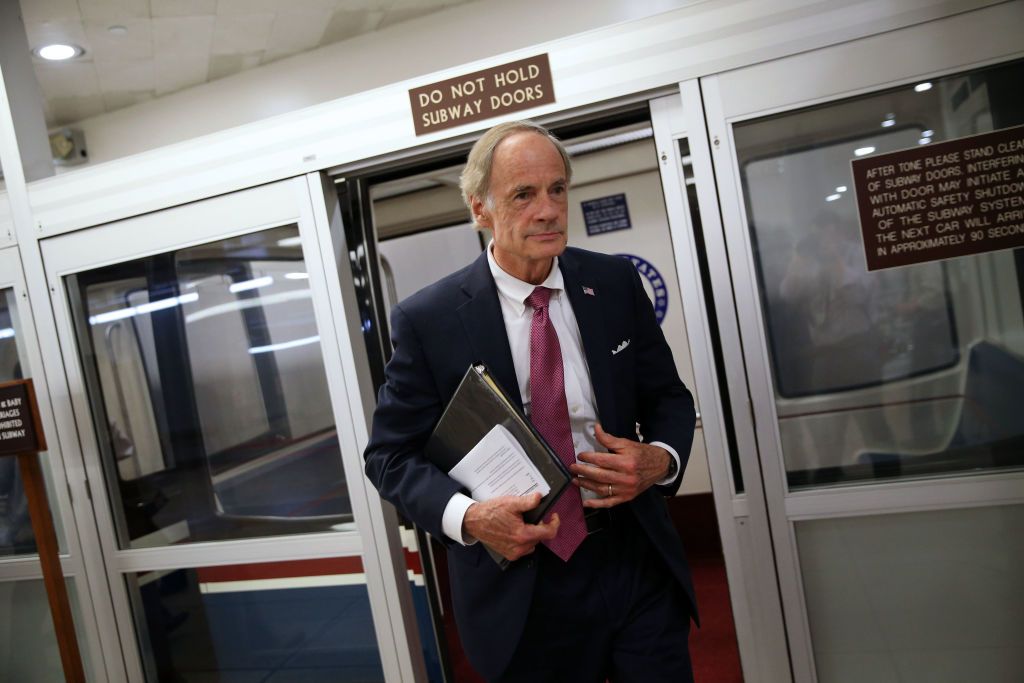 Tom Carper fends of leftist challenge