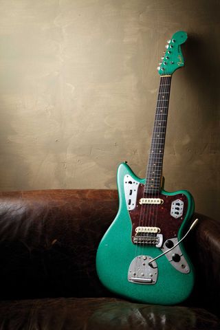 This rare 1962 model features a slab rosewood fretboard and Green Sparkle finish.