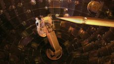 A photo of an engineer working in the target chamber of the National Ignition Facility