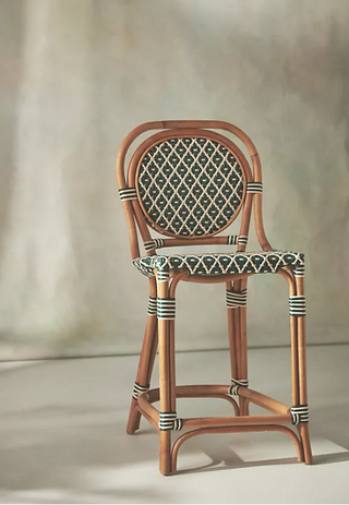 Woven rattan dining chair.