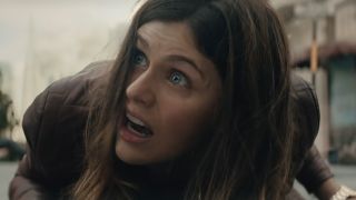 Alexandra Daddario looking scared on the ground in San Andreas