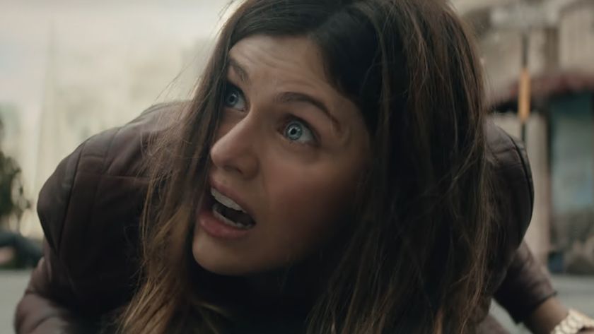 Alexandra Daddario looking scared on the ground in San Andreas