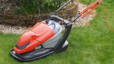 Flymo EasiGlide Plus 330V Hover mower on grass in garden