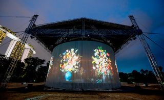 A large light show on a stage.