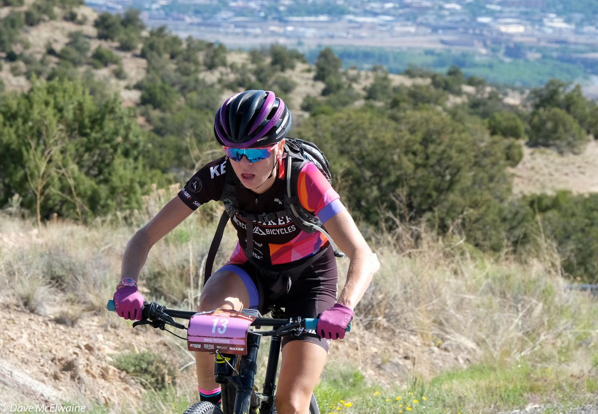 Nikki Peterson (Ridebiker) climbing while one hour into the race