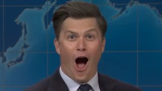 Colin Jost giving an over the top shocked face.