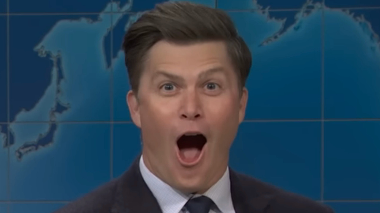 Colin Jost giving an over the top shocked face.