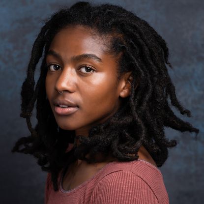 A headshot of the actress Adia from 'Your Mother Your Mother Your Mother.'