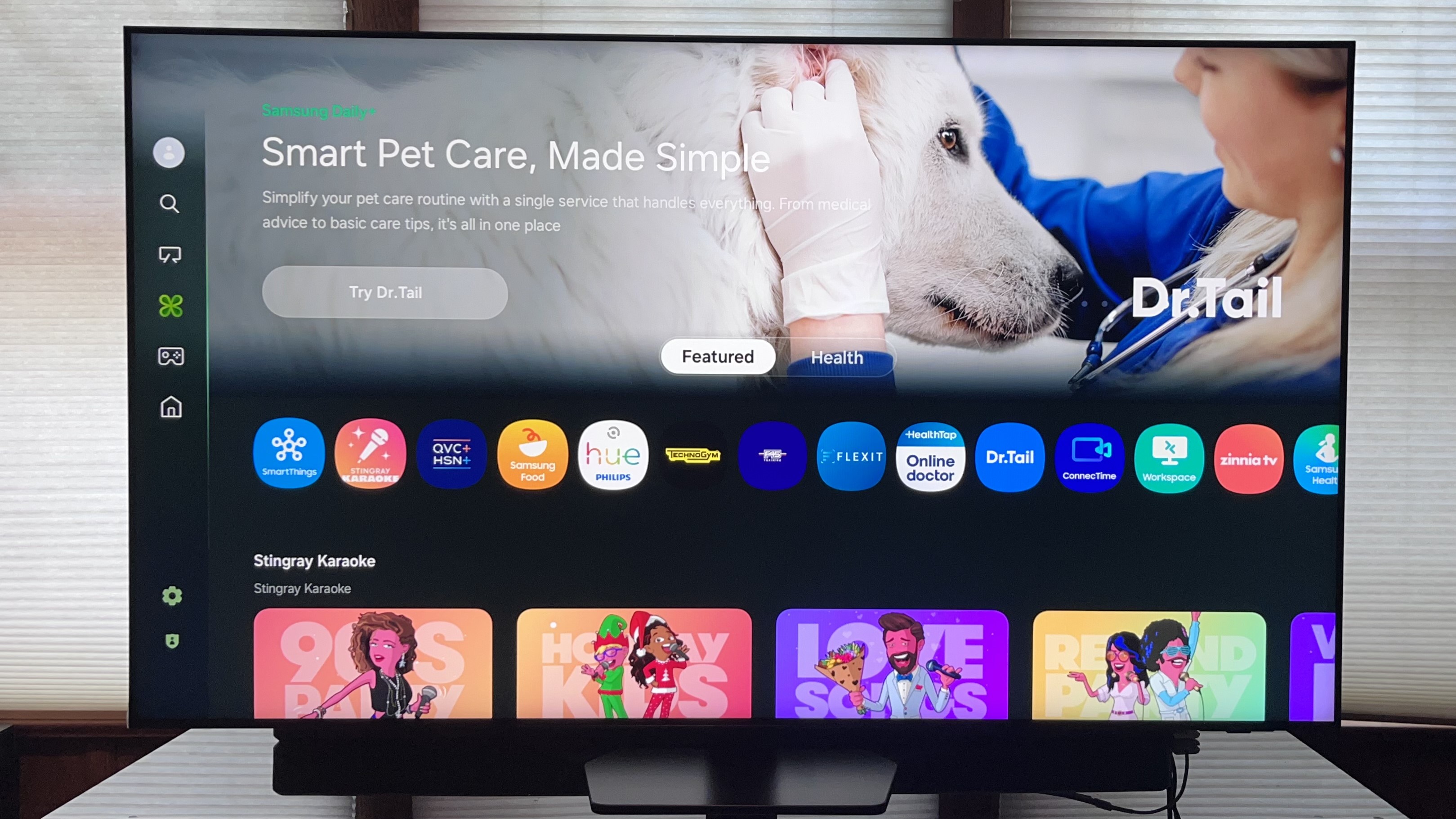 Samsung QN90F smart TV interface showing pet care app