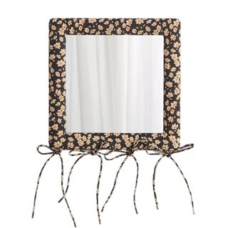 wall mirror with floral patterned fabric frame