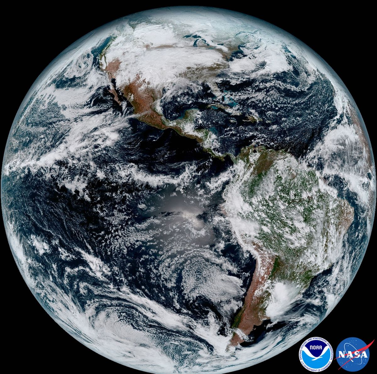 An image from NOAA/NASA satellite, GOES-16, shows a composite color full-disk visible image of Earth on Jan. 15, 2017.