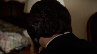 Winston Wolf on phone in Pulp Fiction