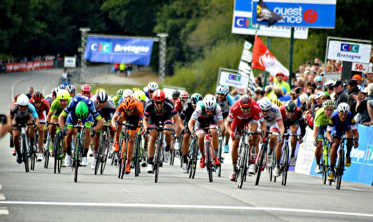 Alexander Kristoff leads the peloton in for third