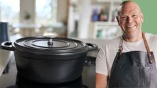 A cutout of Tom Kerridge next to the M&S X Tom Kerridge Cast Iron Casserole Dish being tested in our kitchen