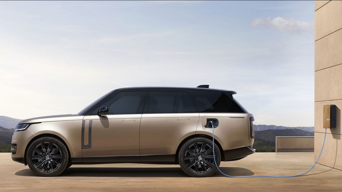 Side profile of the 2022 Range Rover plugged into a charger