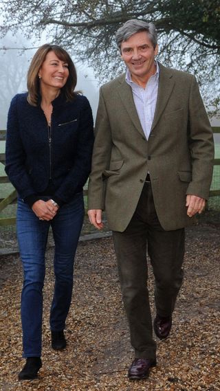 Carole and Michael Middleton walk outside their home in November 2010